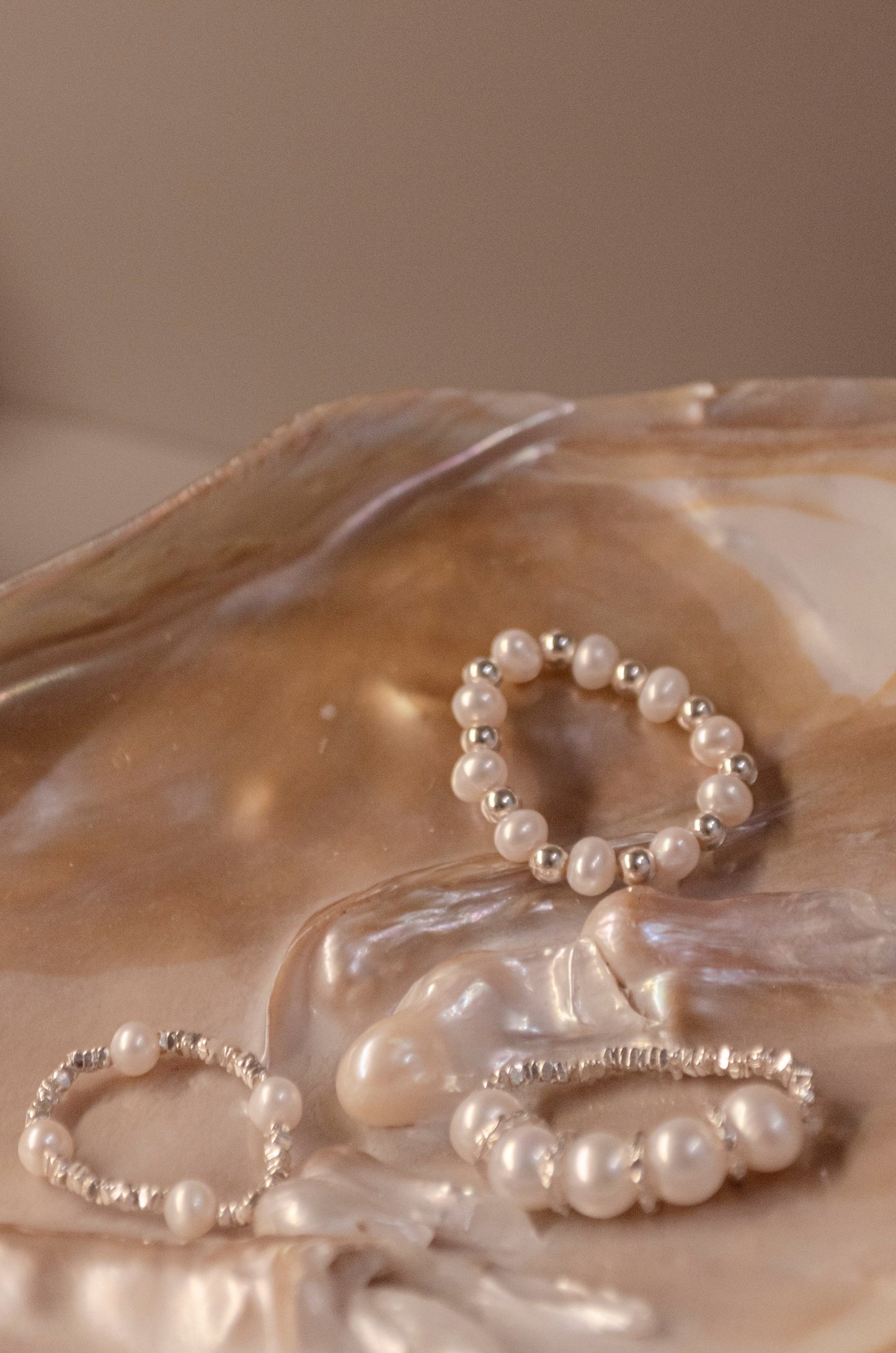 Pearl and silver combo rings