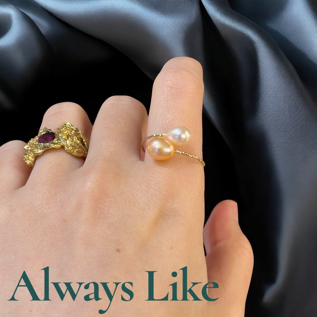 Simple twisted twin pearl ring