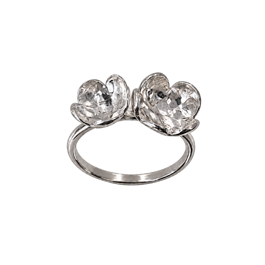 Twin Blossom fine silver ring with neutral silver reflections on white